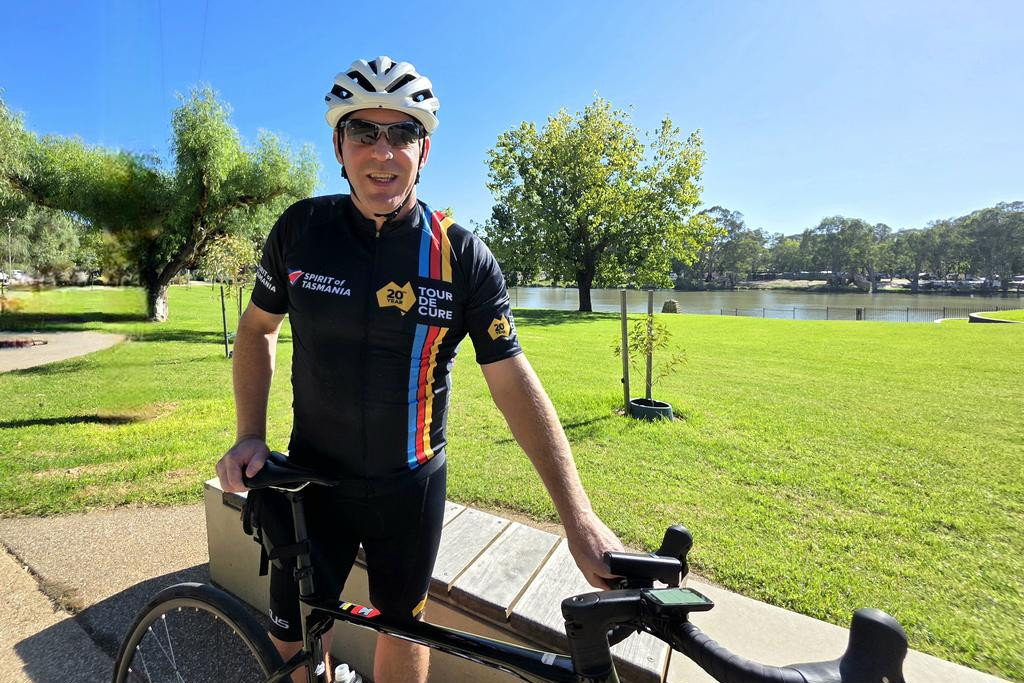 Daniel Cawood is taking on a massive challenge, riding 1400km from Canberra to Hobart to raise funds for cancer research.