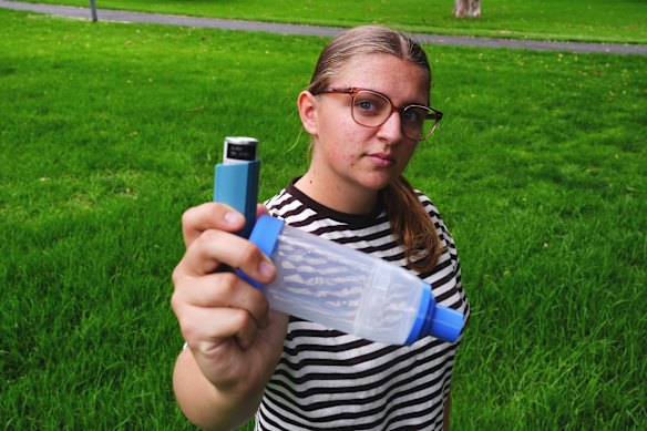 Sinclair with her Ventolin spacer, a device that attaches to a puffer and improves delivery of the medication to the lungs.