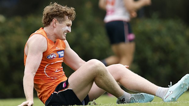 Tom Green injured at training.