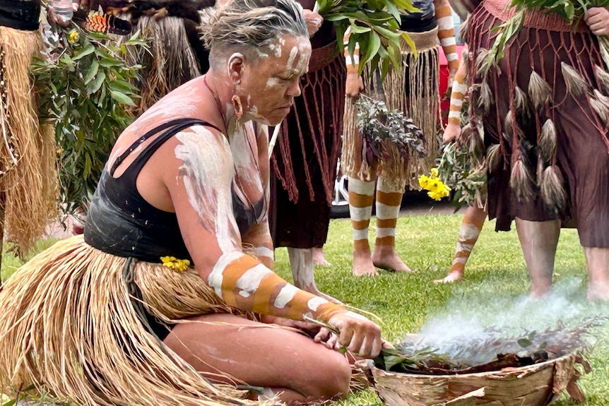 indigenous dancer and smoking ceremony
