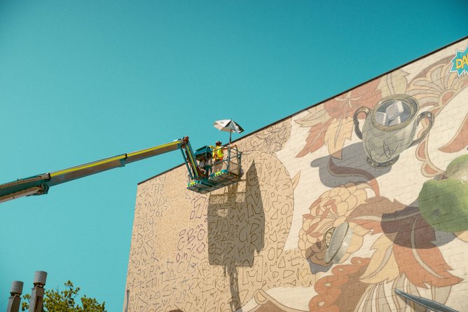 Large murals will adorn blank walls.