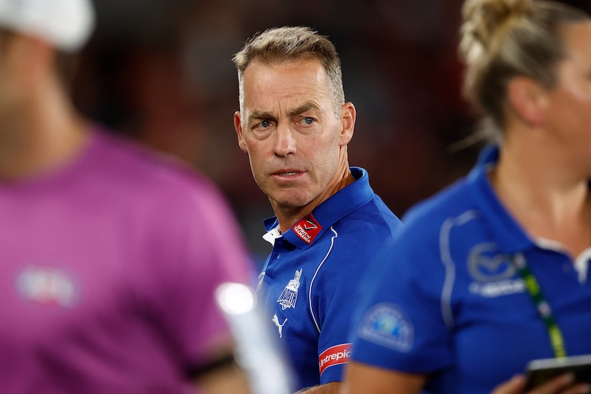 Alastair Clarkson looks over his shoulder during the Kangaroos vs Bombers match.