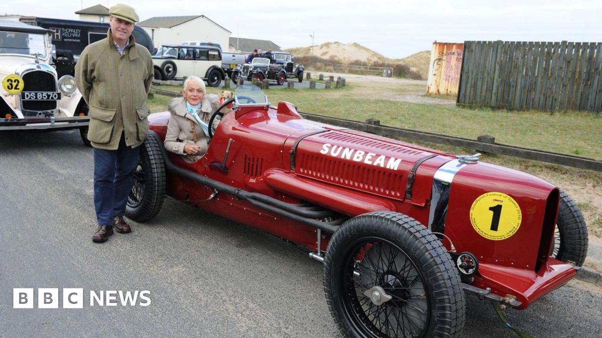 Lieutenant Colonel Stephen Segrave, great nephew of Sir Henry Segrave and Gina Campbell, Daughter of Donald Campbell and Grand Daughter of Major Sir Malcolm Campbell, pictured at Ainsdale in 2016, with the Sunbeam Tiger