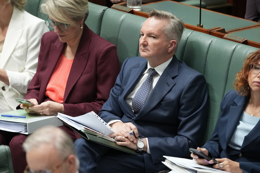 A man sitting in parliament.