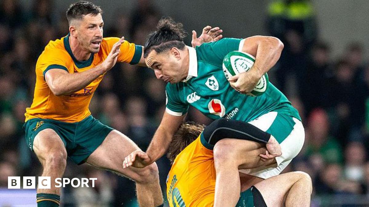 James Lowe is tackled by James O'Connor and Jake Gordon during Ireland's win over Australia last November