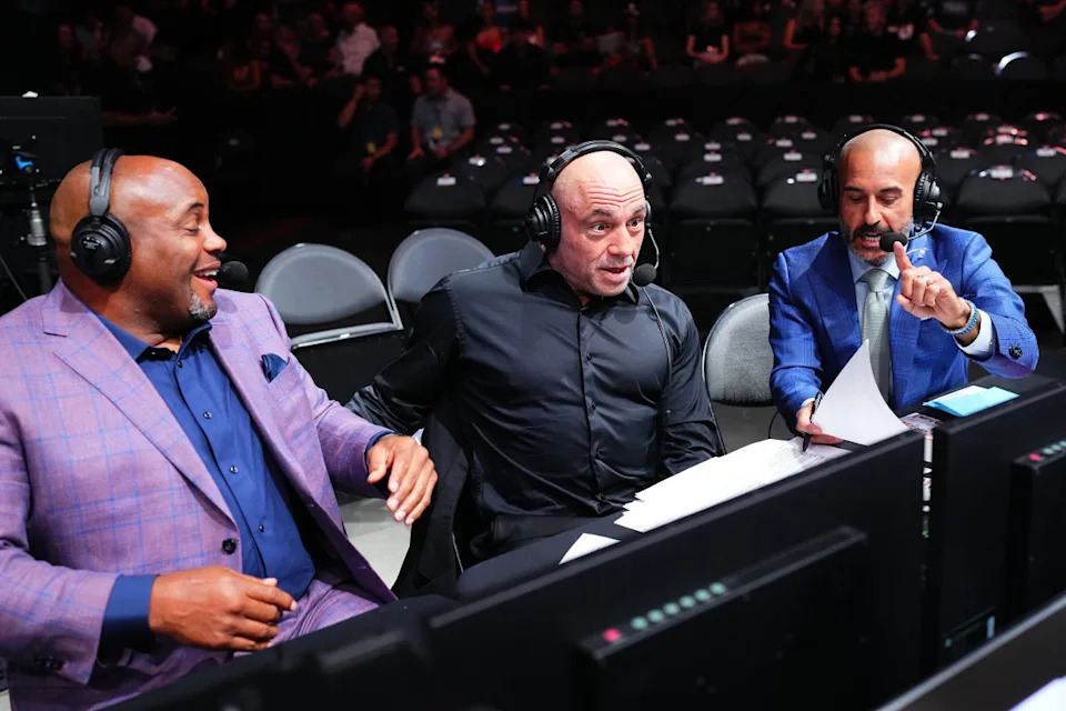 Daniel Cormier, Joe Rogan, and Jon AnikChris Unger-GettyImages