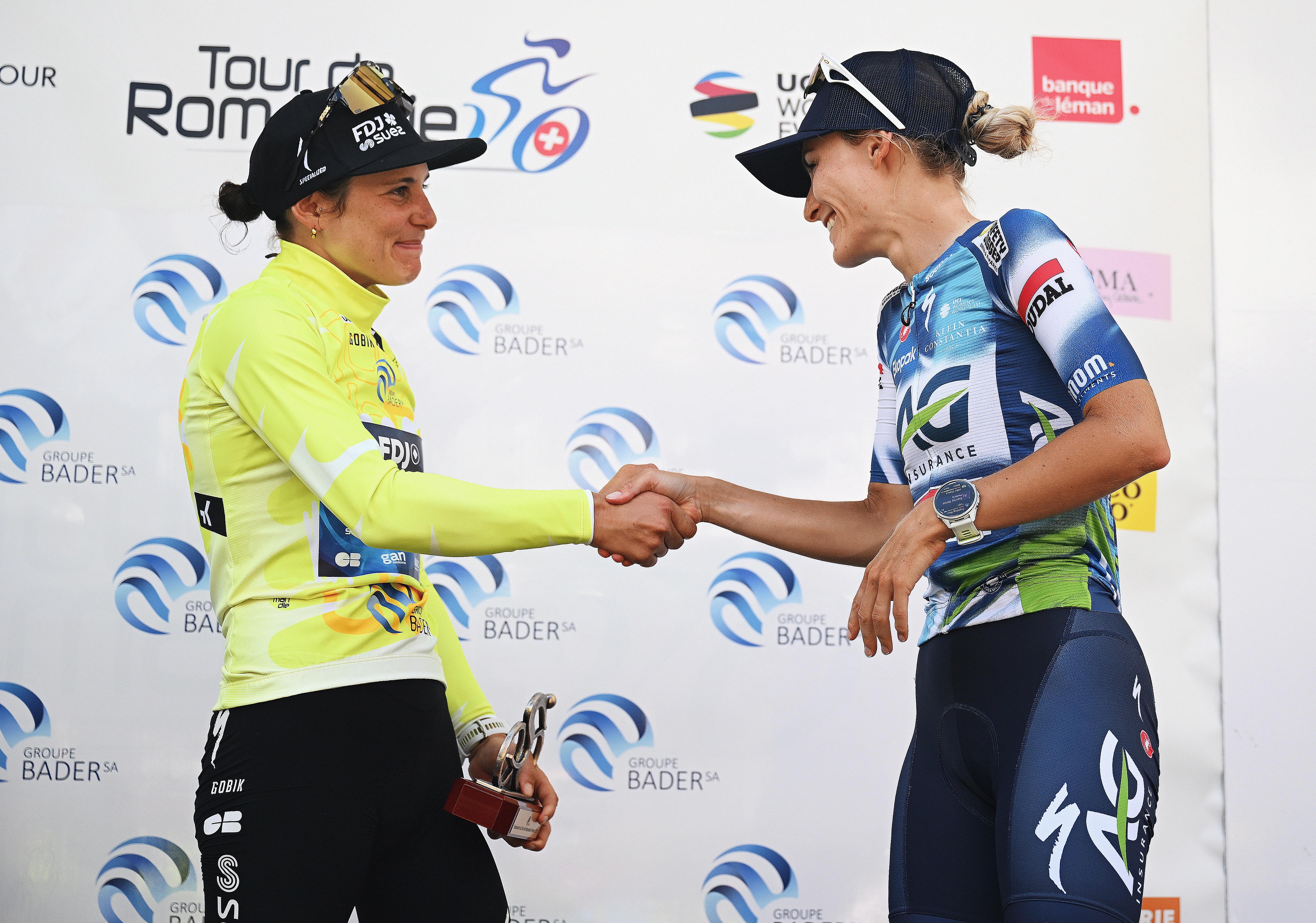 AIGLE, SWITZERLAND - AUGUST 17: (L-R) The Yellow Leader Jersey, Elise Chabbey of Switzerland and Team FDJ - SUEZ and the second classified Urska Zigart of Slovenia and Team AG Insurance - Soudal congratulate each other at podium during the 4th Tour de Romandie Feminin 2025, Stage 3 a 122.1km stage from Aigle to Aigle / #UCIWWT / on August 17, 2025 in Aigle, Switzerland. (Photo by Dario Belingheri/Getty Images)