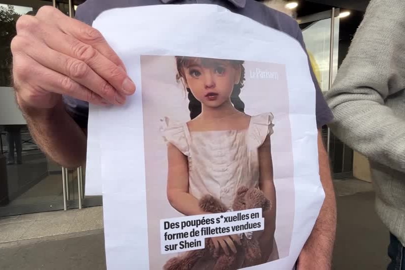 An image of a child on a t-shirt with some French writing