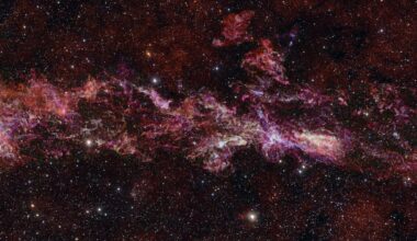 The largest image of the Milky Way's center, captured by the ESO's ALMA array. Credit: ALMA (ESO/NAOJ/NRAO)/S. Longmore et al./ESO/D. Minniti et al.(background)