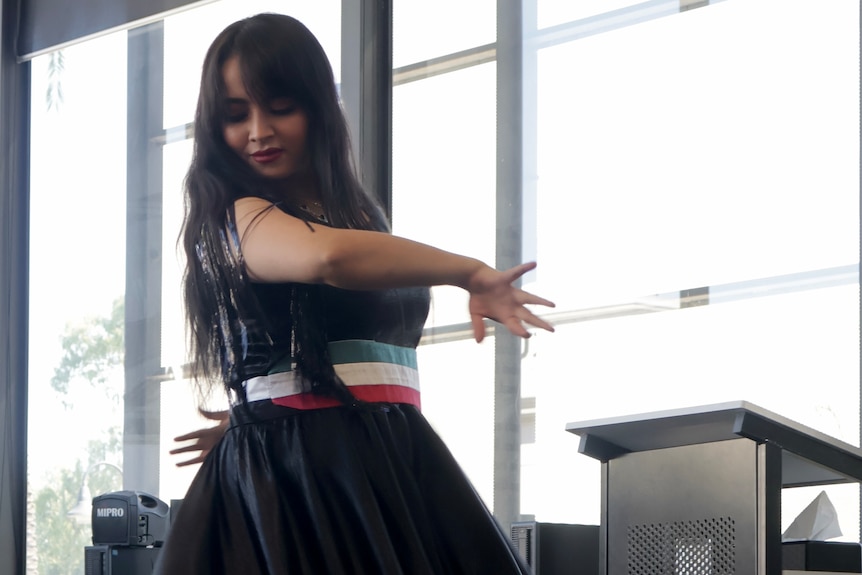 Local Iranian artist from Wagga Wagga performances traditional dance for Iranian New Year. 
