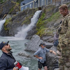 Director Patrick Hughes with Alan Ritchson on the set.