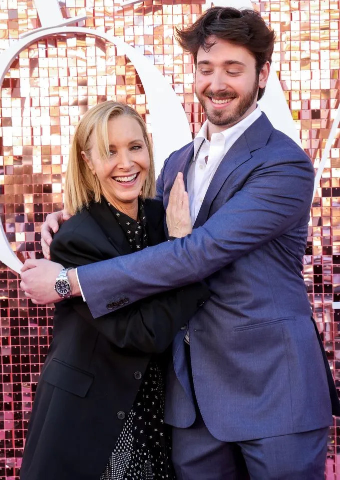 (L-R) Lisa Kudrow hugs son Julian Murray Stern at 'The Comeback' season 3 premiereCredit: Julian Hamilton/FilmMagic