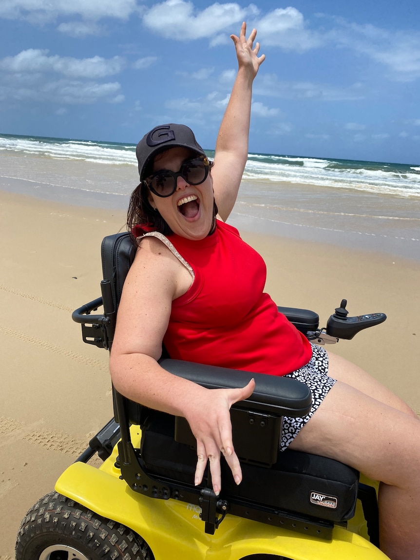 Peta Hooke on the beach enjoying herself