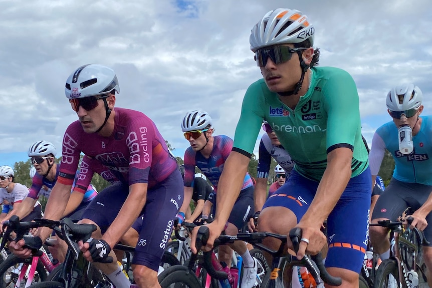 Oliver Bleddyn rides in the pack