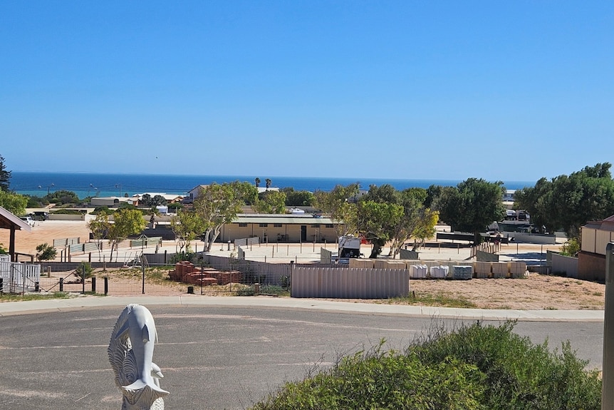 An empty caravan park by the ocean