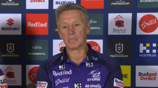 Craig Bellamy prepares to speak to media post-game.