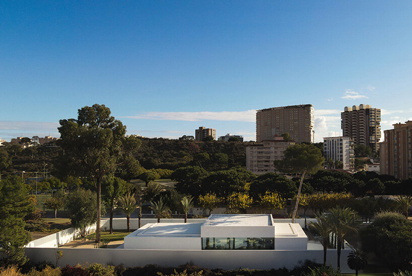 fran silvestre organizes three-part house around hovering living volume in spain - 1