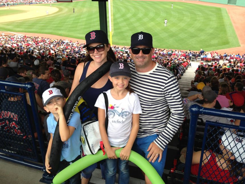 Scott George and his family at Boston's Fenway Park following the family's move to the US city.
