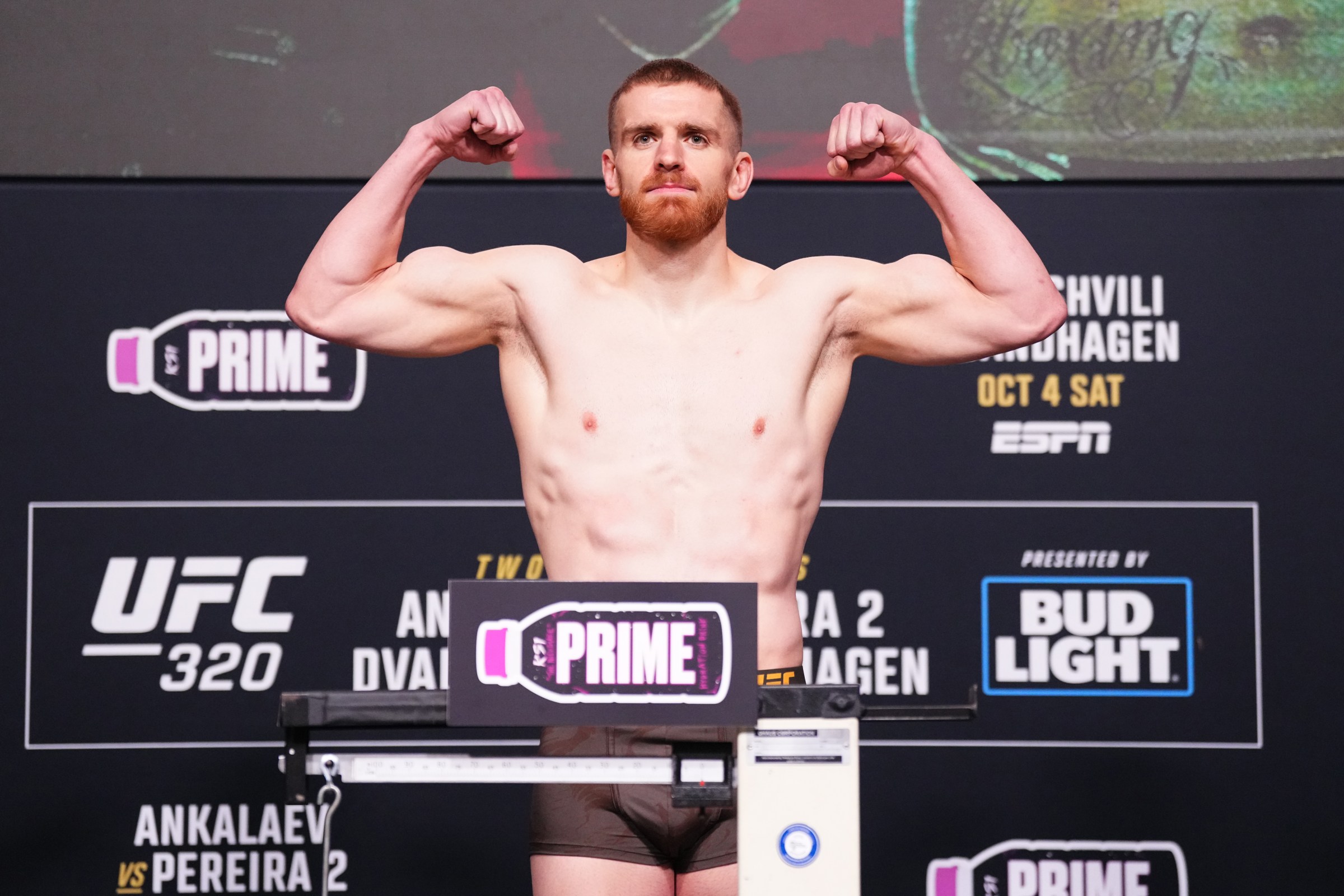 LAS VEGAS, NEVADA - OCTOBER 03: Edmen Shahbazyan poses on the scale during the UFC 320 official weigh-ins at UFC Apex on October 03, 2025 in Las Vegas, Nevada. (Photo by Jeff Bottari/Zuffa LLC)