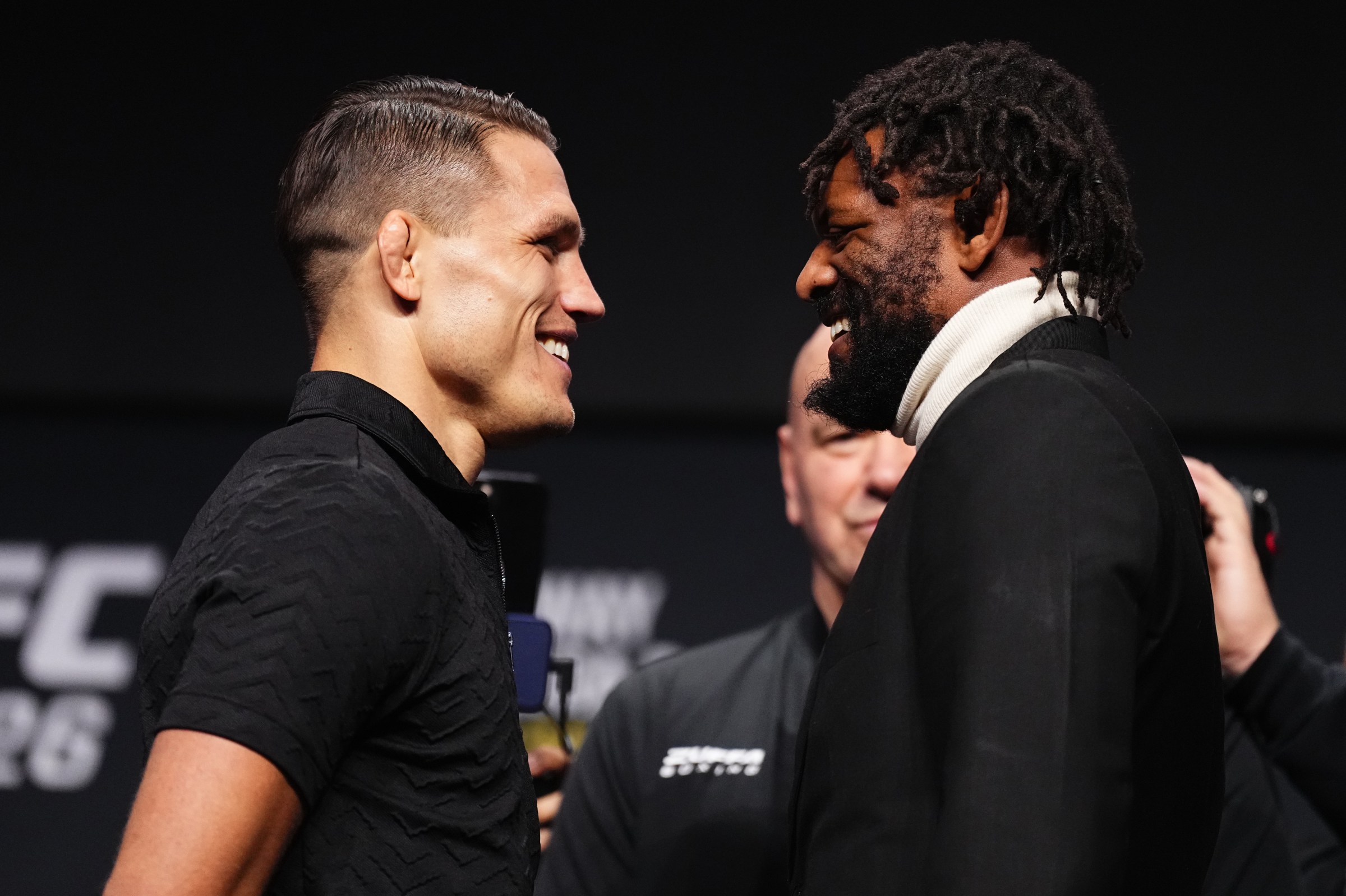 LAS VEGAS, NEVADA - MARCH 05: (L-R) Opponents Drew Dober and Michael Johnson face off during the UFC 326 press conference at MGM Grand Garden Arena on March 05, 2026 in Las Vegas, Nevada. (Photo by Jeff Bottari/Zuffa LLC)