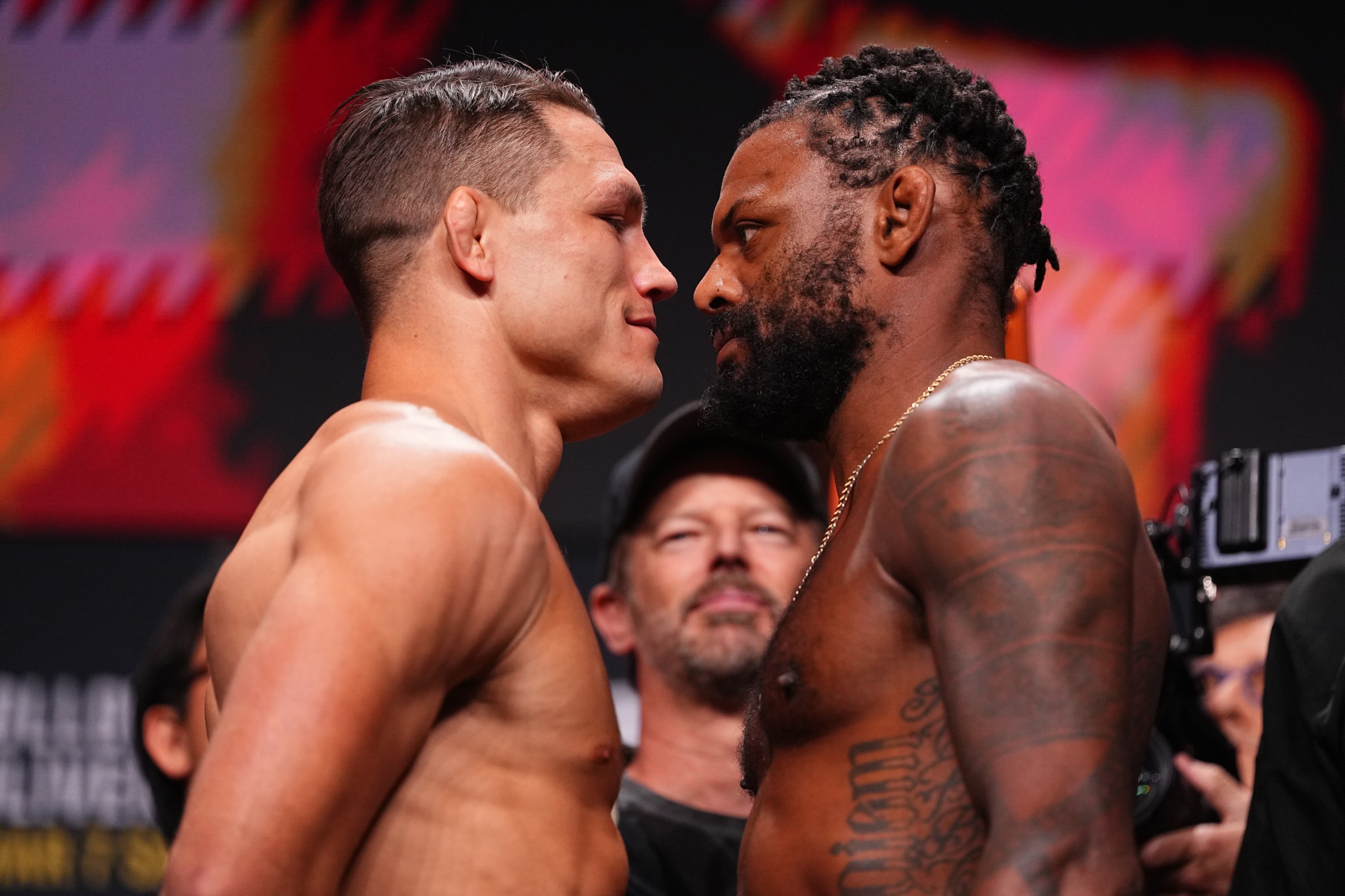 LAS VEGAS, NEVADA - MARCH 06: (L-R) Opponents Drew Dober and Michael Johnson face off during the UFC 326 ceremonial weigh-in at MGM Grand Garden Arena on March 06, 2026 in Las Vegas, Nevada. (Photo by Chris Unger/Zuffa LLC)