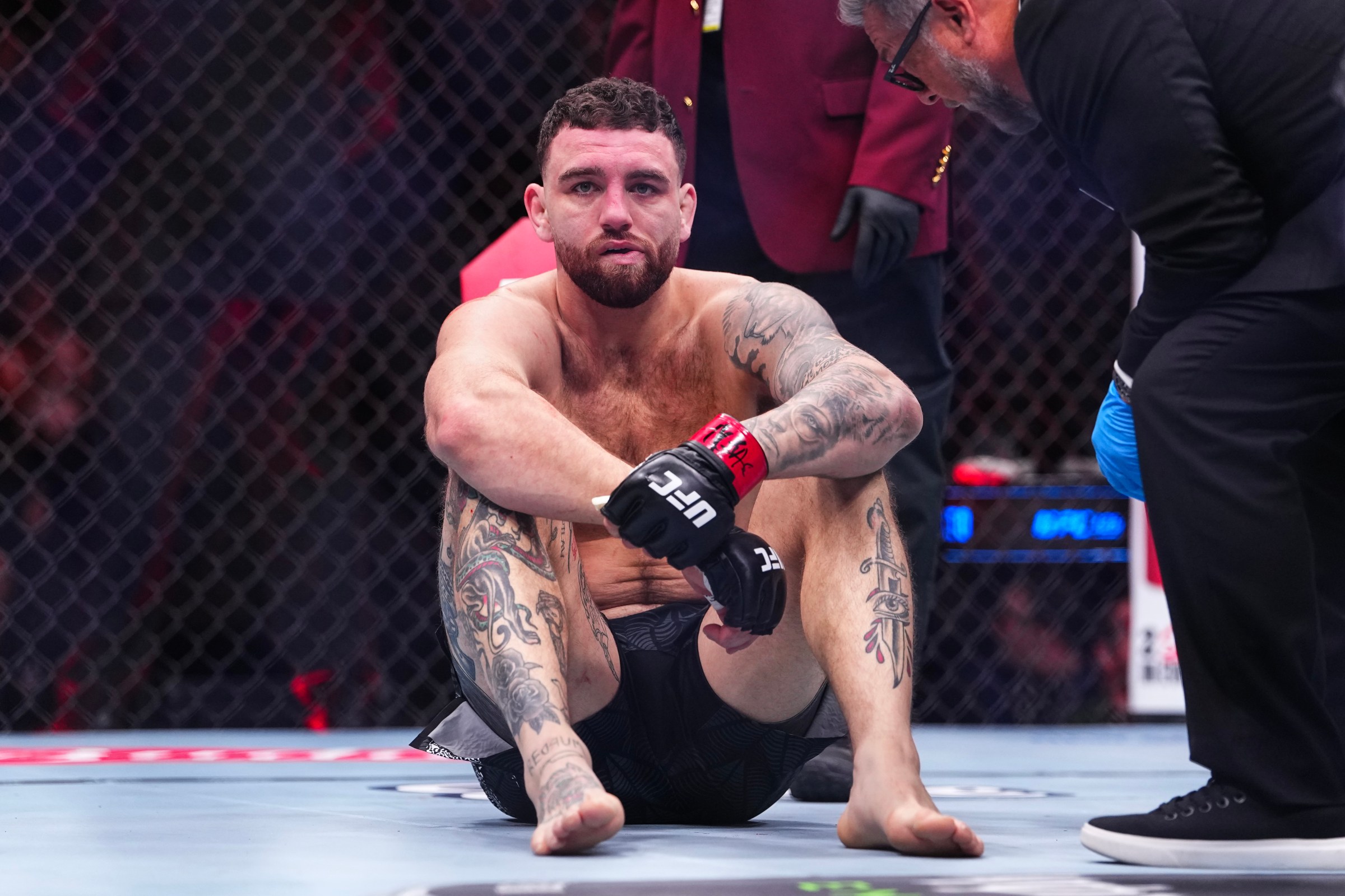 LAS VEGAS, NEVADA - MARCH 07: Luke Fernandez reacts to his loss in a light heavyweight fight during the UFC 326 event at T-Mobile Arena on March 07, 2026 in Las Vegas, Nevada. (Photo by Chris Unger/Zuffa LLC)