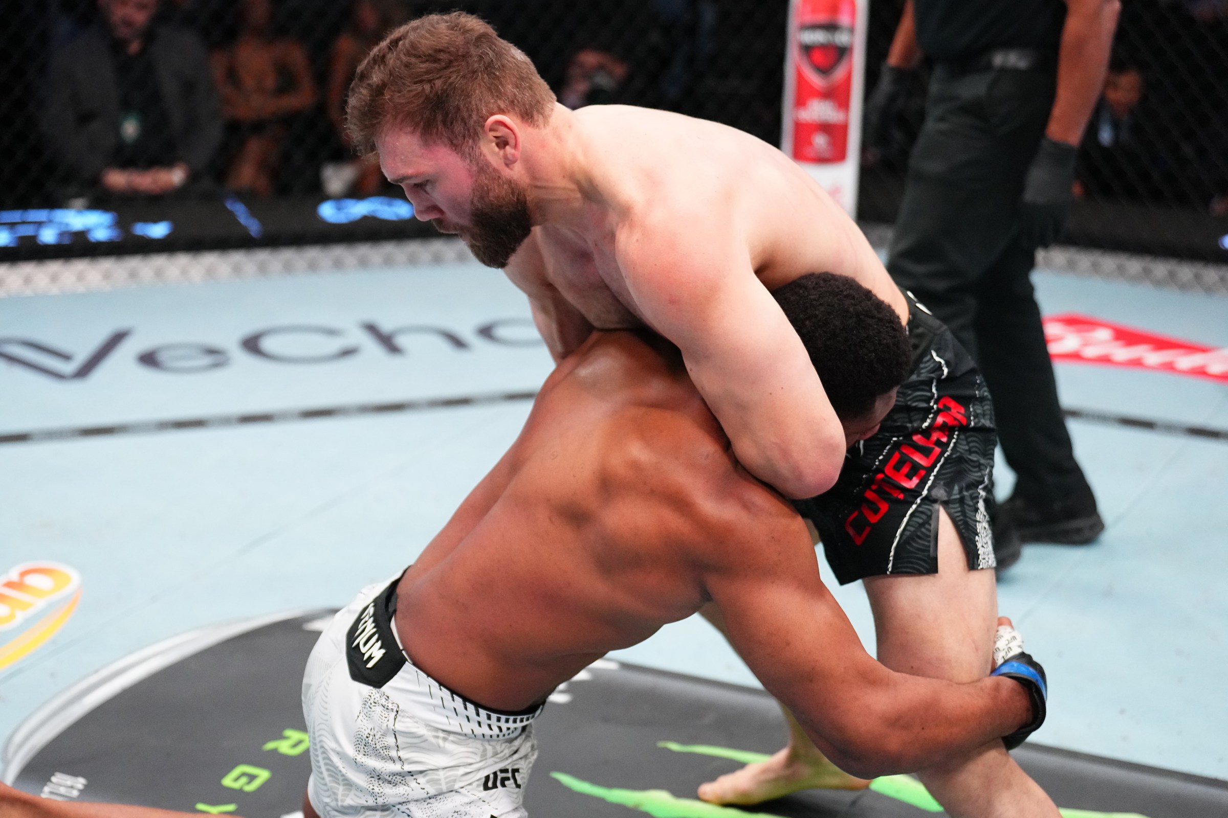 LAS VEGAS, NEVADA - MARCH 14: (R-L) Ion Cutelaba of Moldova defends a takedown against Oumar Sy of France in a light heavyweight fight during the UFC Fight Night event at Meta APEX on March 14, 2026 in Las Vegas, Nevada. (Photo by Chris Unger/Zuffa LLC)