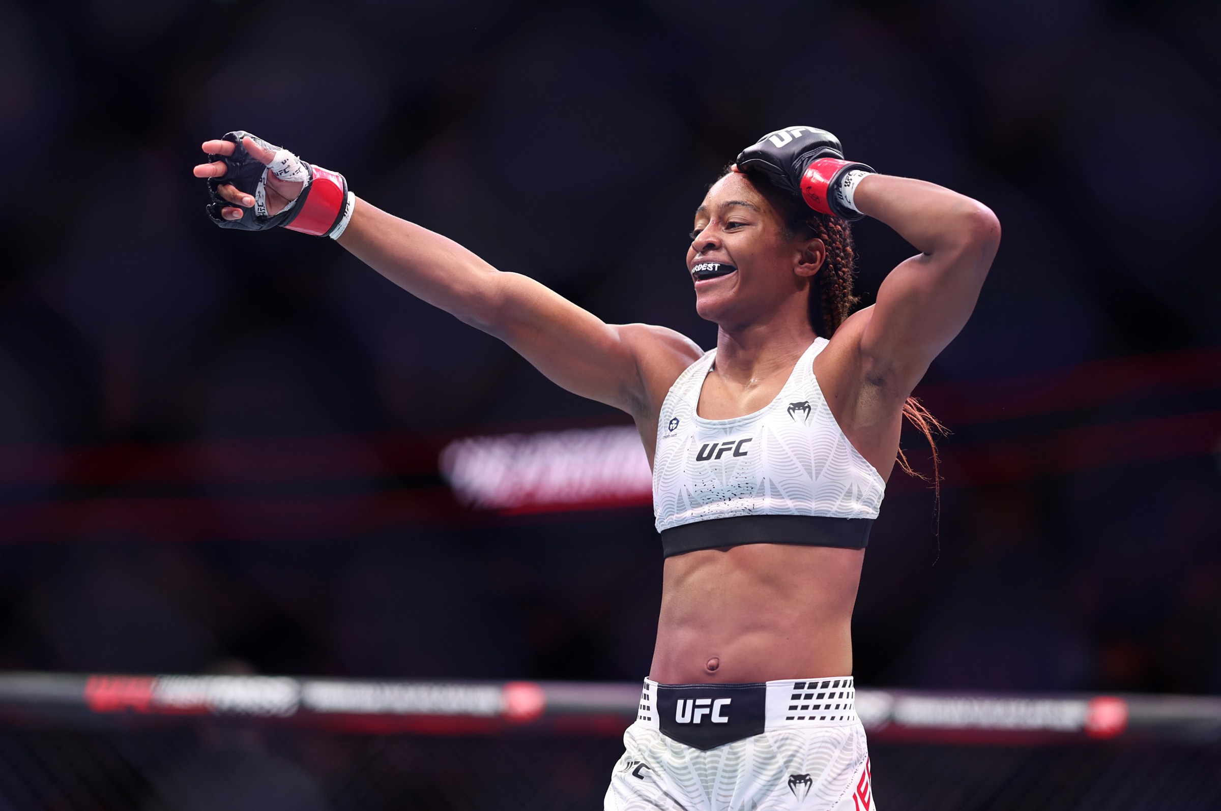 LONDON, ENGLAND - MARCH 21: Shanelle Dyer celebrates her victory of the strawweight bout between Shanelle Dyer and Ravena Oliveira at The O2 Arena on March 21, 2026 in London, England. (Photo by Jasper Wax/Getty Images)
