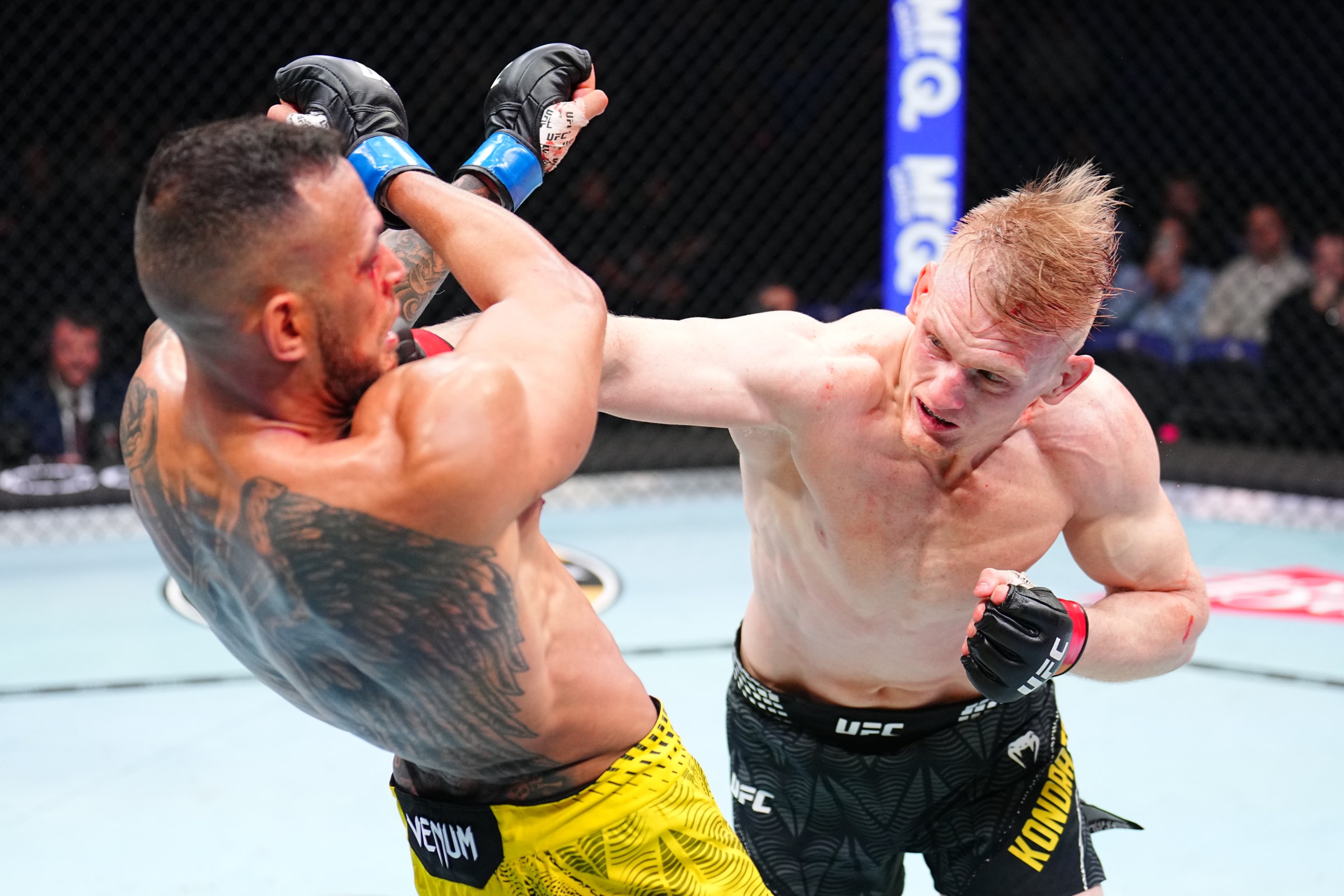 LONDON, ENGLAND - MARCH 21: (R-L) Mantas Kondratavicius of Lithuania punches Antonio Trocoli of Brazil in a middleweight fight during the UFC Fight Night event at The O2 on March 21, 2026 in London, England. (Photo by Chris Unger/Zuffa LLC)