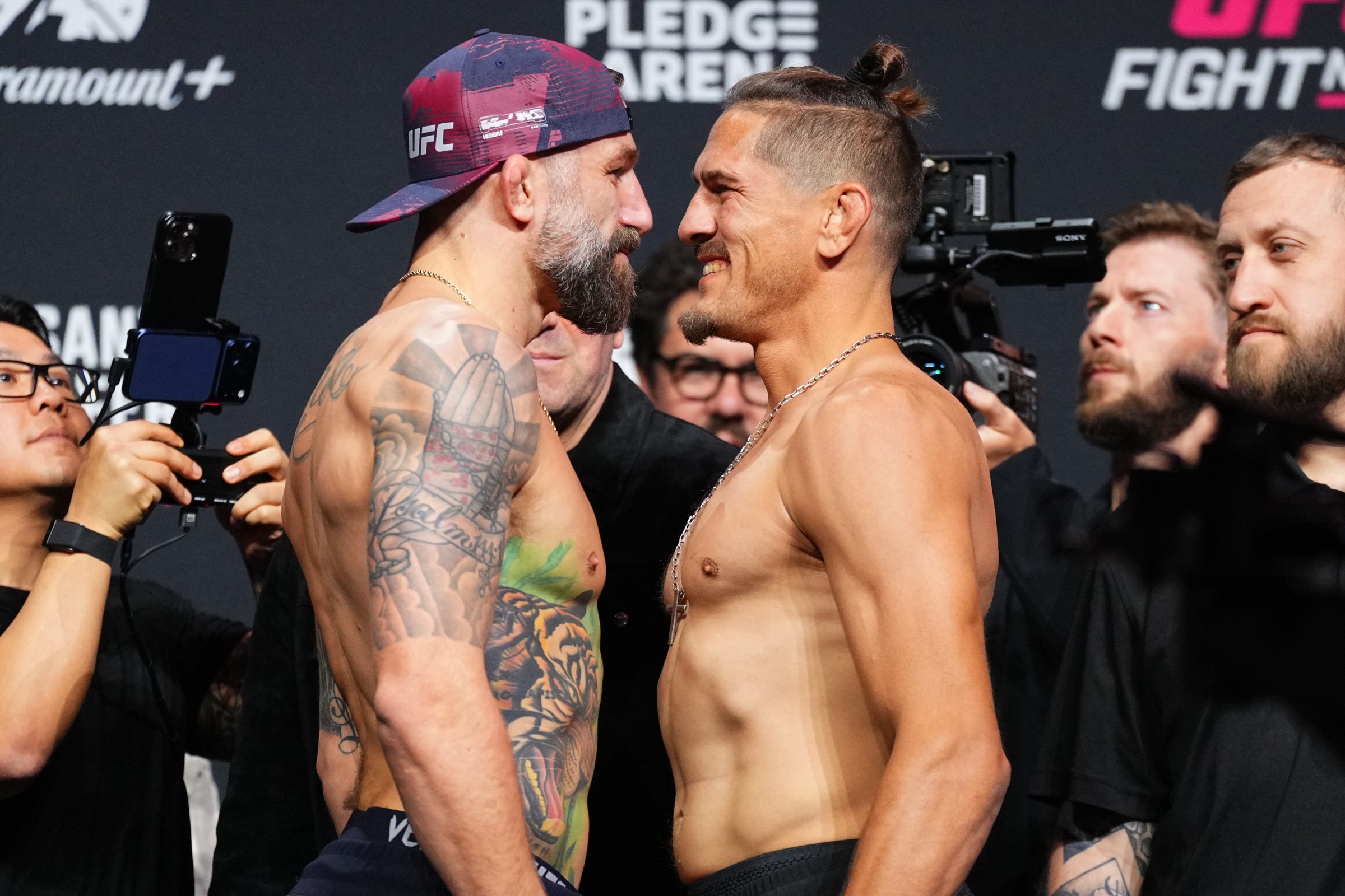 SEATTLE, WASHINGTON - MARCH 27: (L-R) Opponents Michael Chiesa and Niko Price face off during the UFC Fight Night ceremonial weigh-in at Climate Pledge Arena on March 27, 2026 in Seattle, Washington. (Photo by Jeff Bottari/Zuffa LLC)