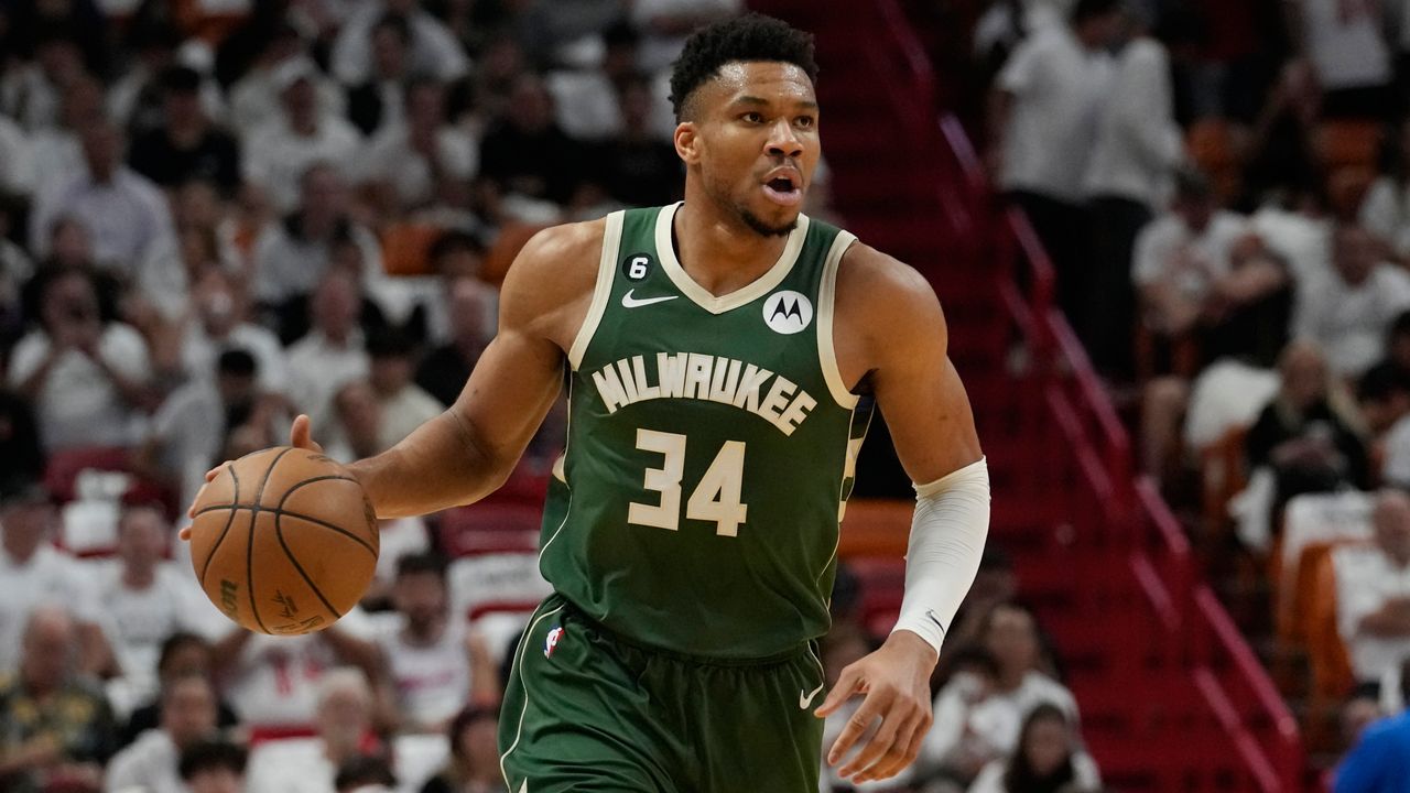 Milwaukee Bucks forward Giannis Antetokounmpo (34) dribbles during the first half of Game 4 in a first-round NBA basketball playoff series against the Miami Heat, Monday, April 24, 2023, in Miami.