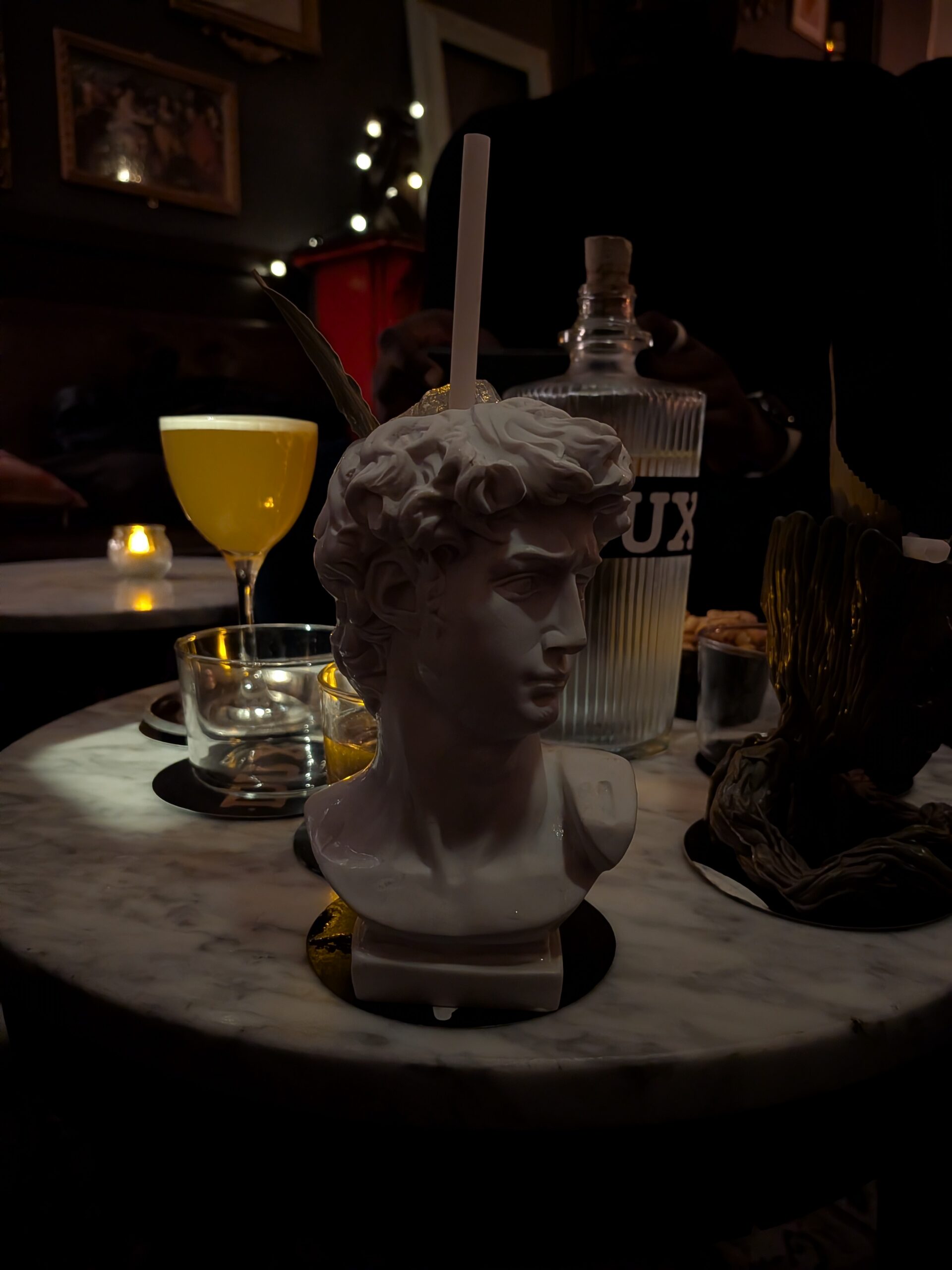 A photo of a drink in a cocktail bar, taken with the Google Pixel 10a.