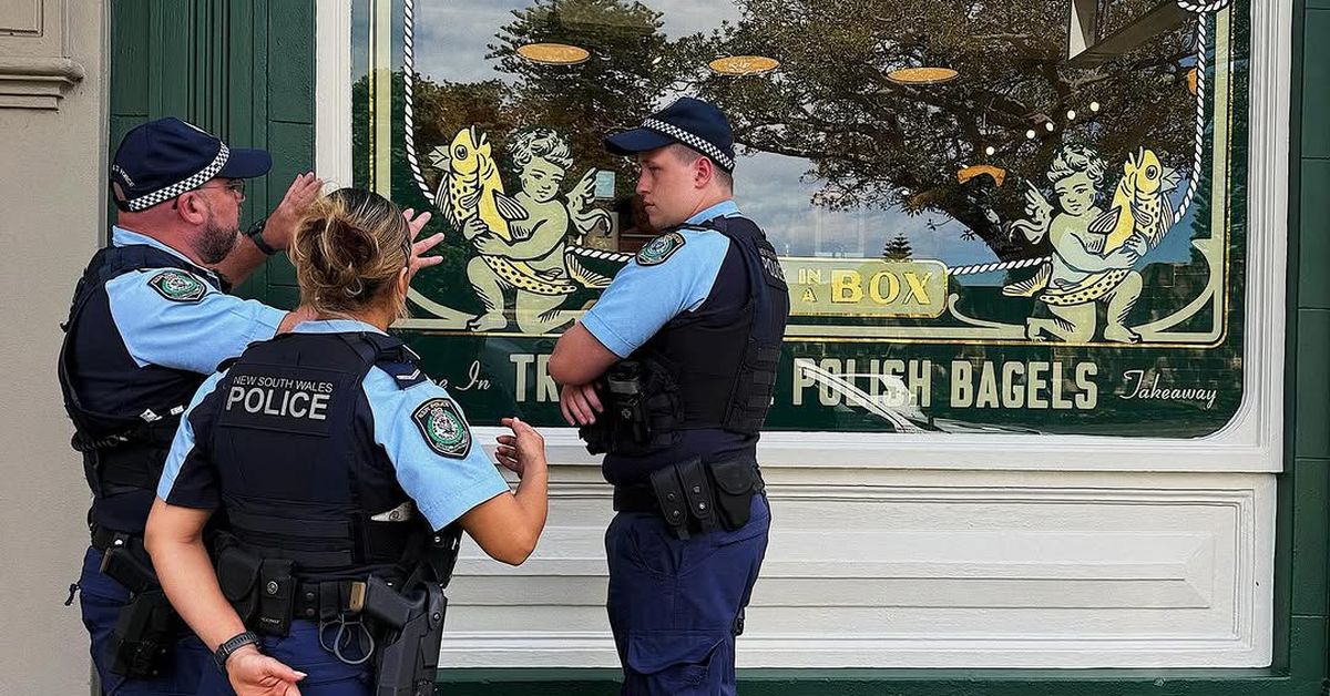 Hate symbol etched into glass of popular Jewish business in Sydney's CBD