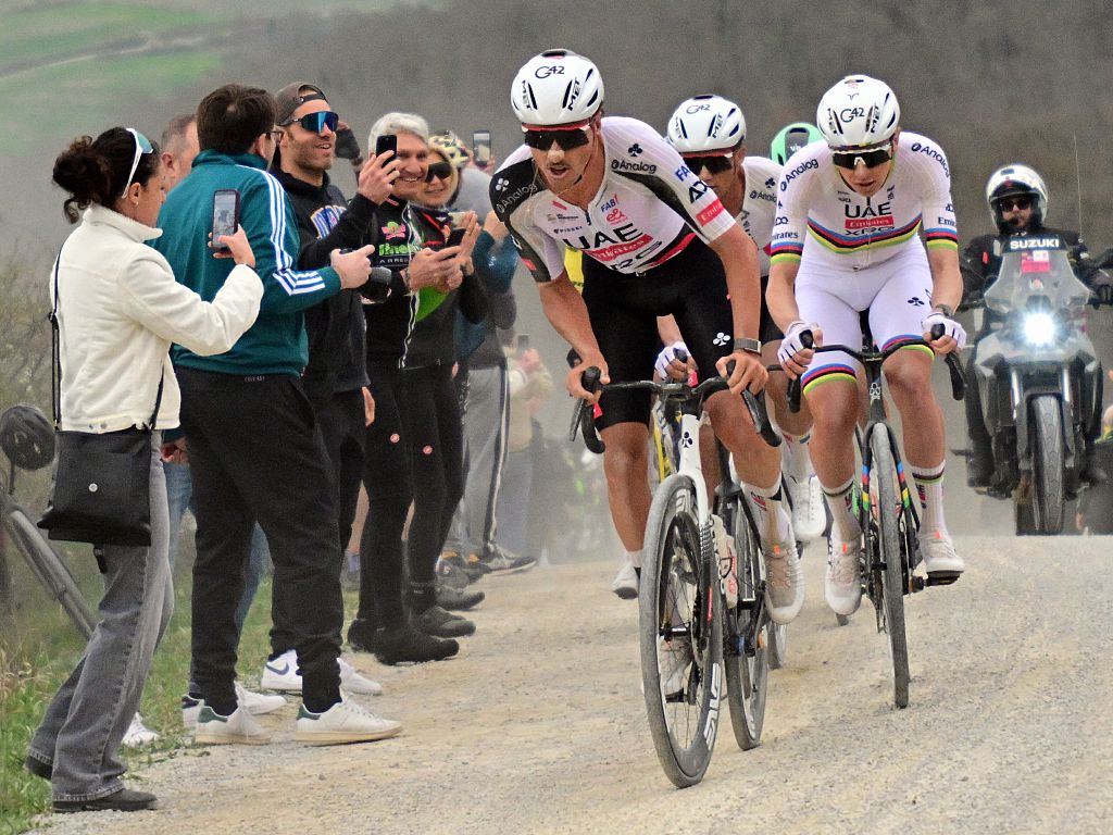Slovenian Tadej Pogacar of UAE Team Emirates - XRG and Slovenian Tadej Pogacar of UAE Team Emirates - XRG the men elite 'Strade Bianche' one day cycling race, 203km from and to Siena, Italy on Saturday 07 March 2026. BELGA PHOTO DIRK WAEM (Photo by DIRK WAEM / BELGA MAG / Belga via AFP)