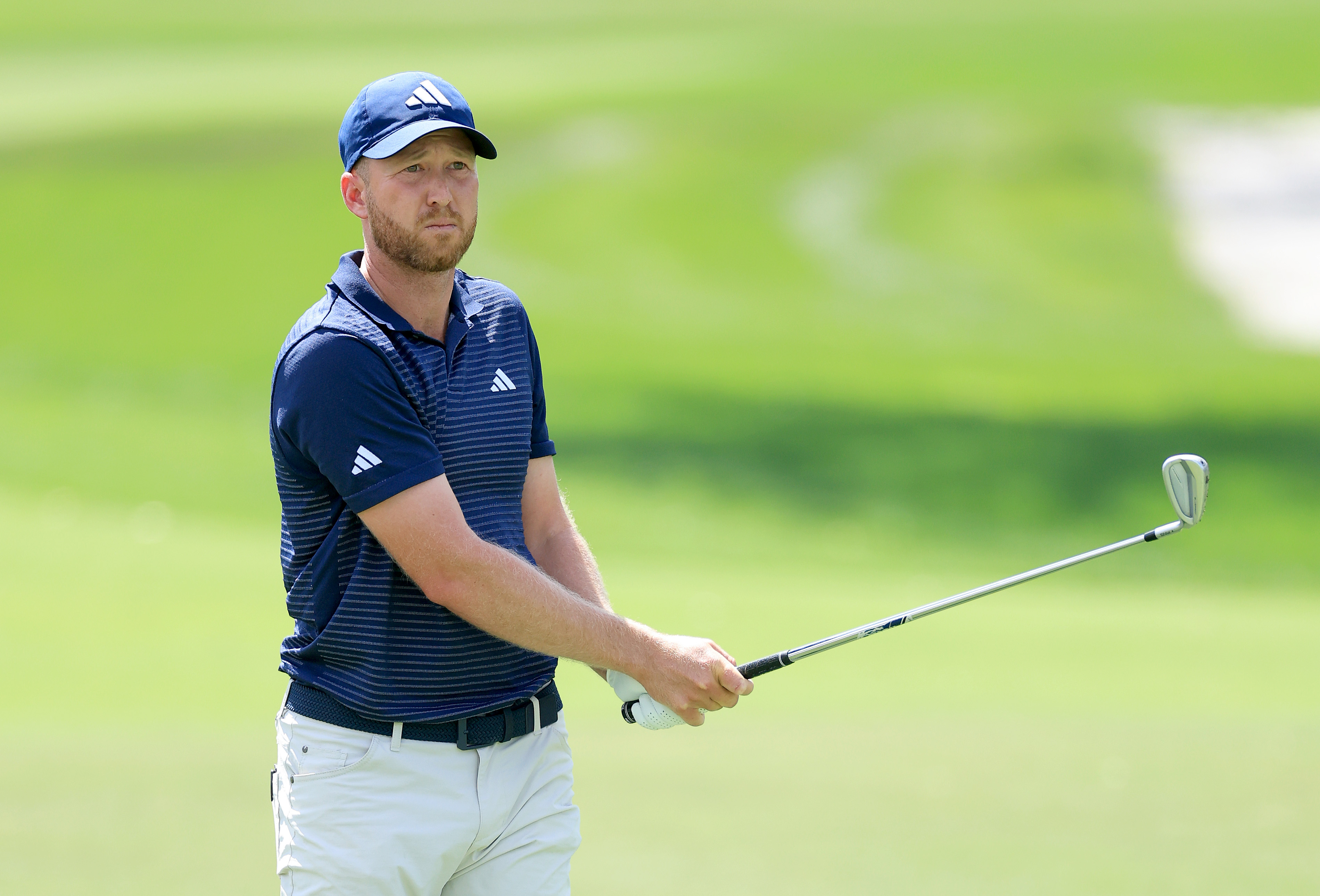 Daniel Berger hits an iron shot