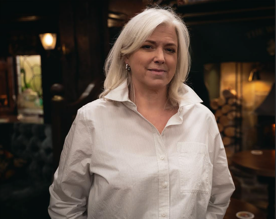 Caroline Harker as Doctor Todd in Emmerdale caroline harker as doctor todd in emmerdale posing in a pub in a white shirt.