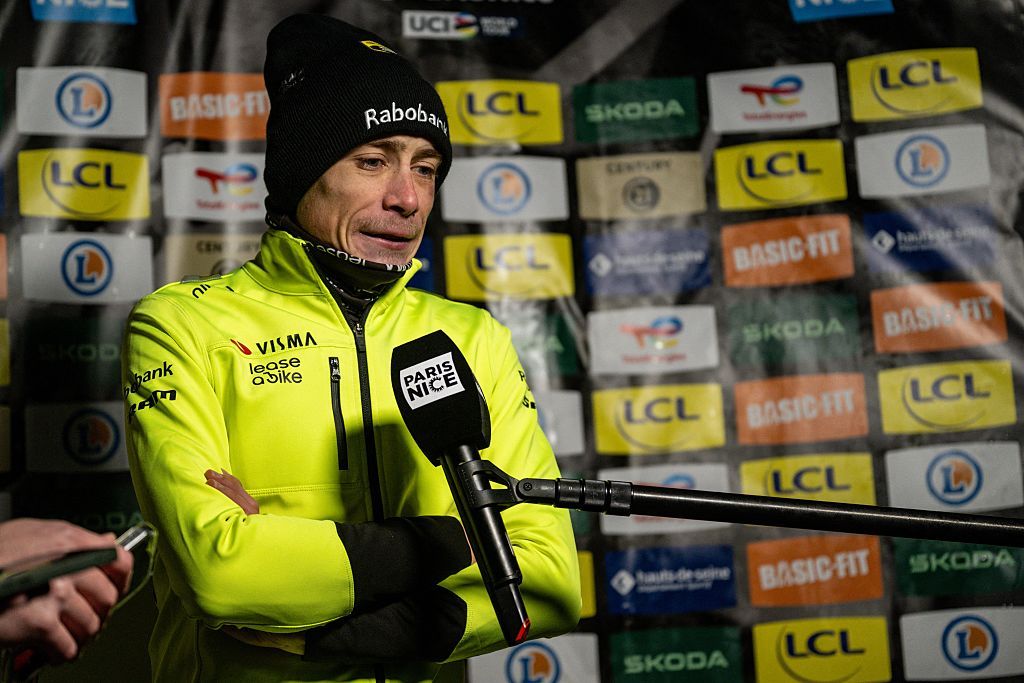 Jonas Vingegaard speaks to the press after a rainy stage 4 at Paris-Nice