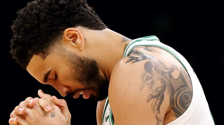 Jayson Tatum says a pre-game prayer before a Celtics game.