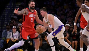 Houston Rockets center Steven Adams (12) guards Los Angeles Lakers guard Luka Doncic during the first half of an NBA basketball game on Thursday in LA. (AP Photo/Jayne Kamin-Oncea)