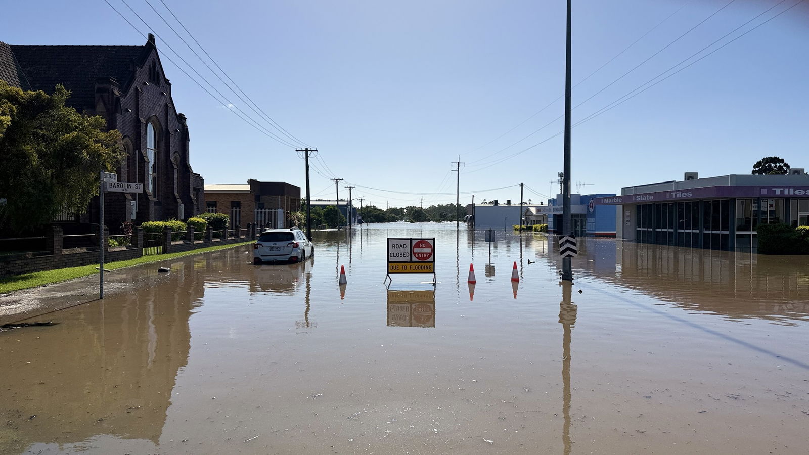 A photo of a closed flooded road 