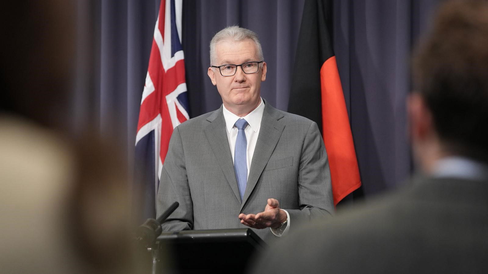 Burke answers questions.