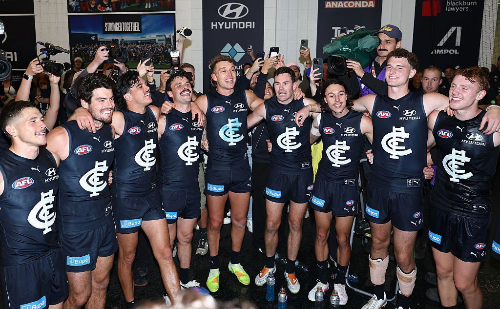 Carlton players celebrate
