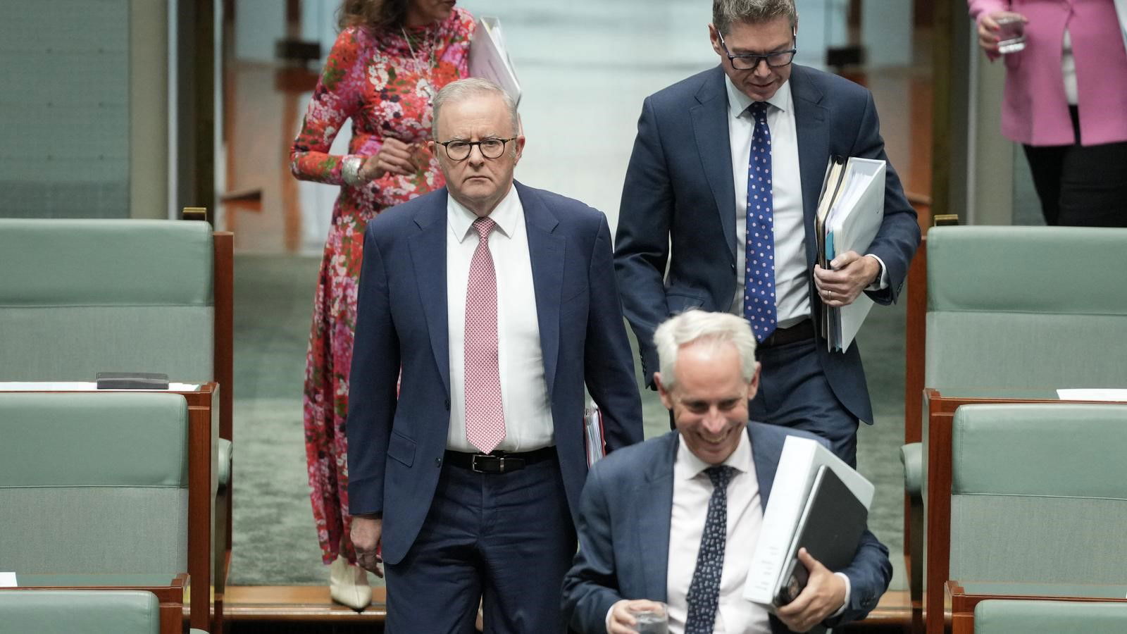 The prime minister walks into Question Time.