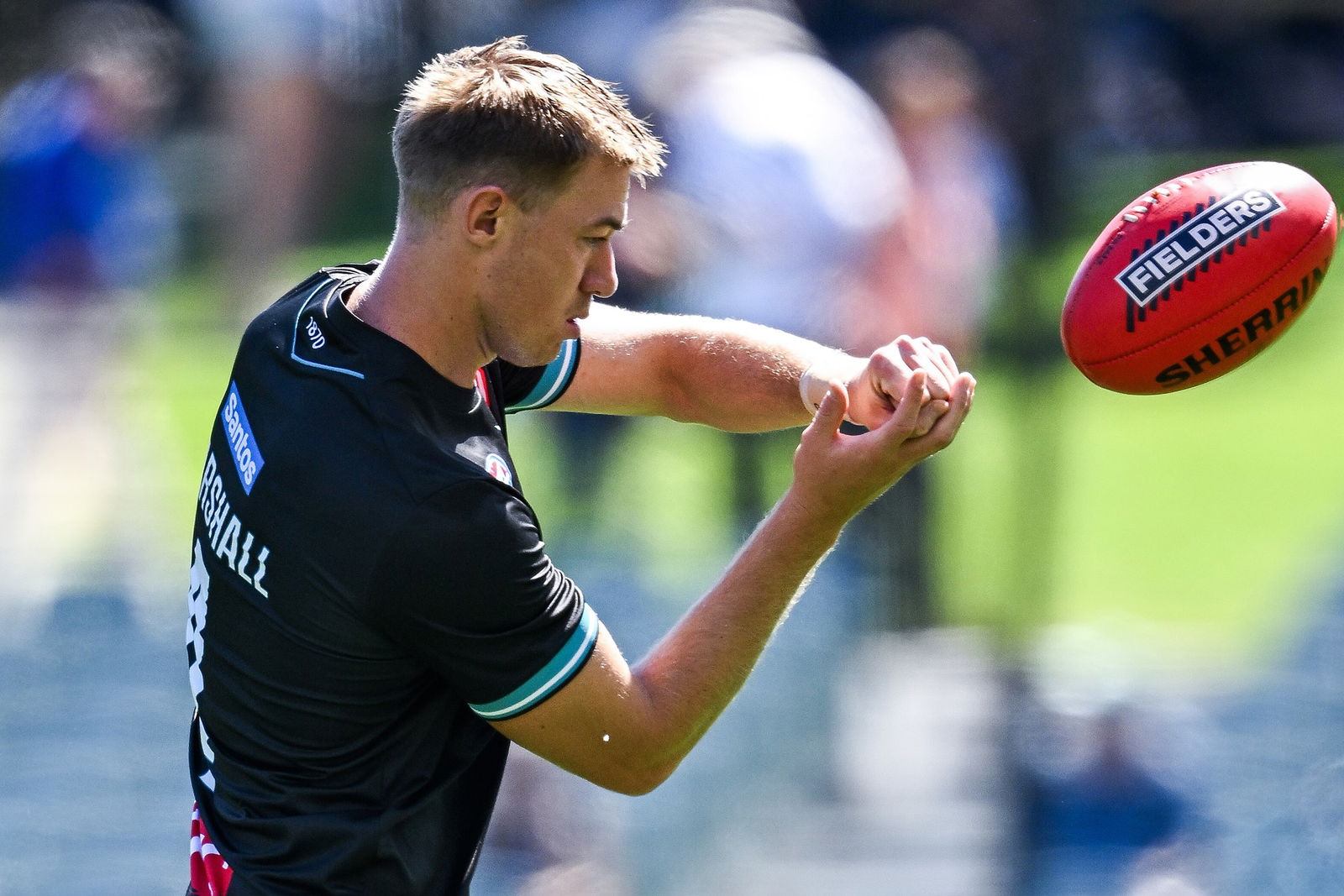 Port Adelaide forward Todd Marshall goes through his warm-ups ahead of the clash against Essendon at the Adelaide Oval.