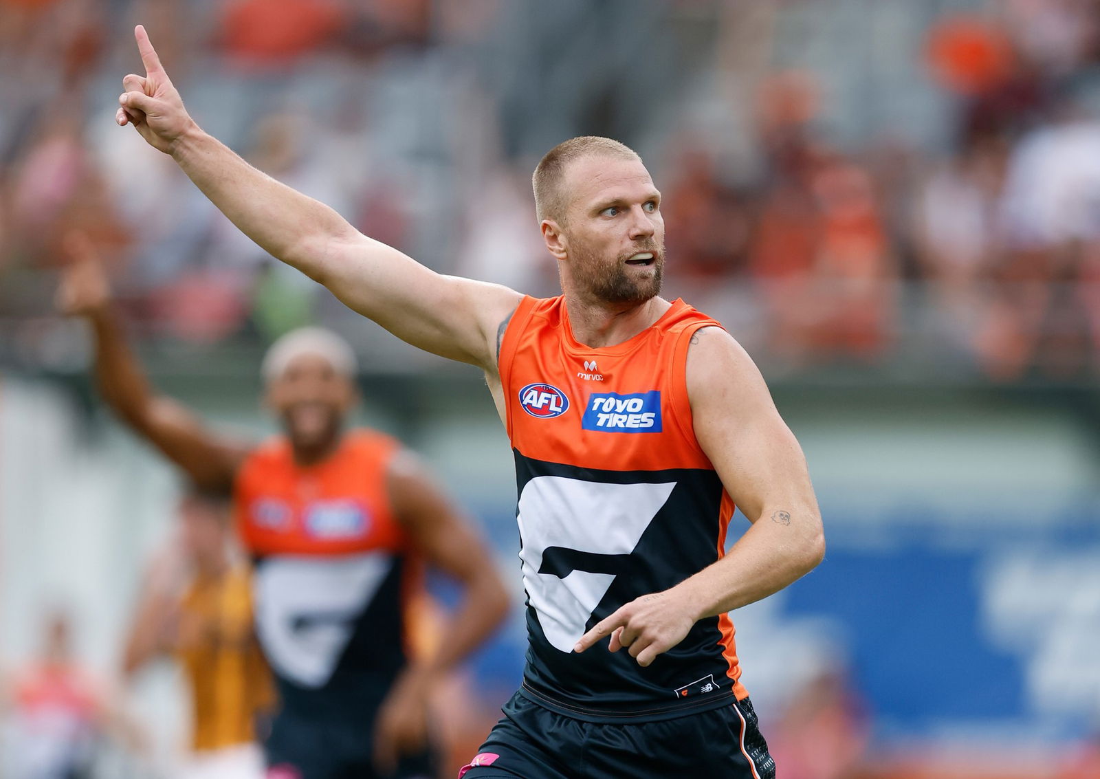 Jake Stringer of the Giants celebrates a goal during the 2026 AFL Opening Round match between the GWS Giants and the Hawthorn Hawks at ENGIE Stadium on March 7, 2026 in Sydney, Australia.