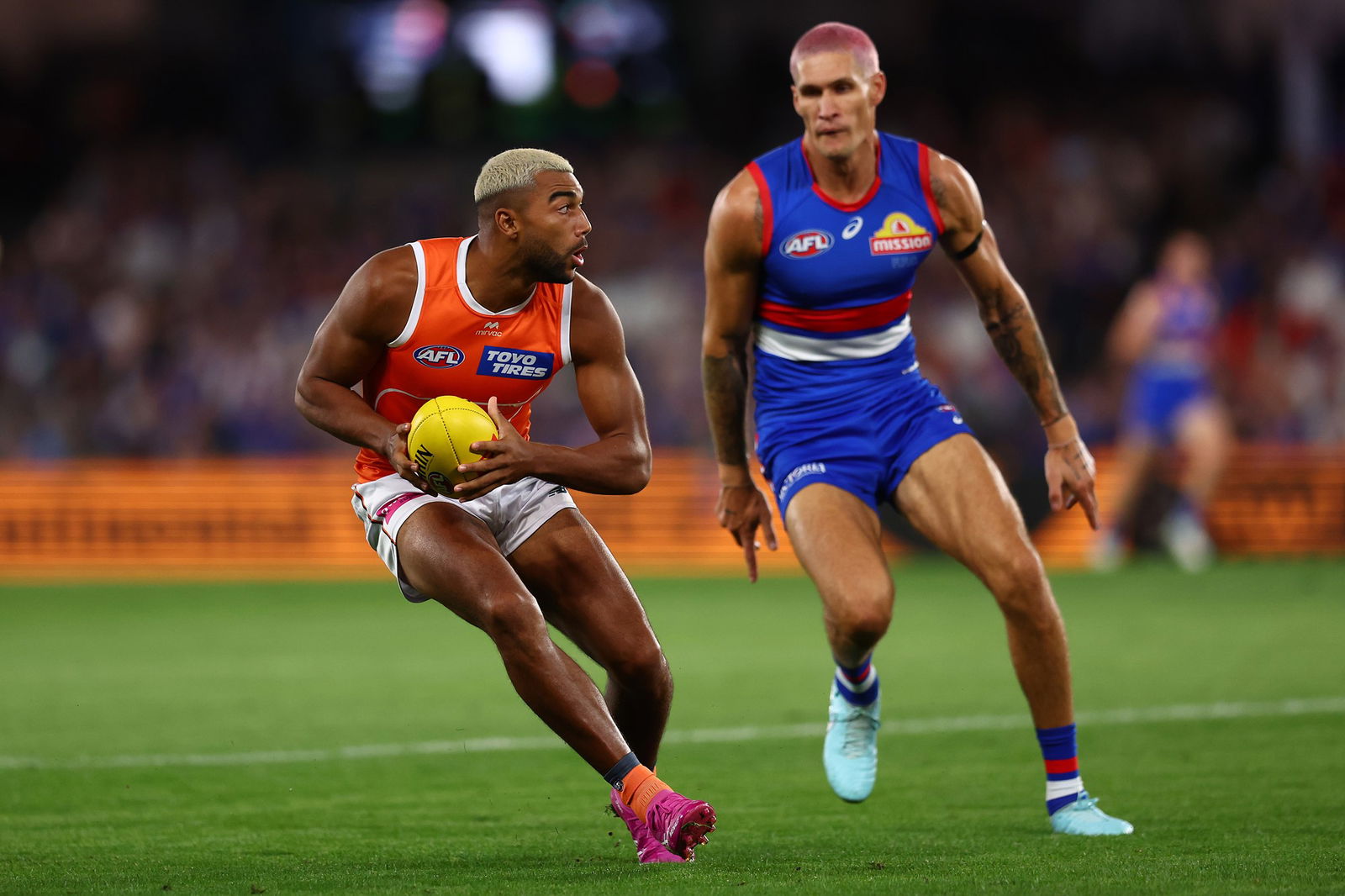 Callum Brown under defensive pressure from Rory Lobb.