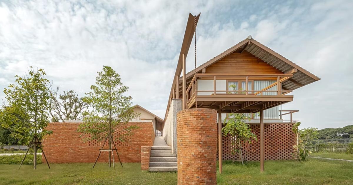 brick and concrete sculpt elevated river residence by bodinchapa