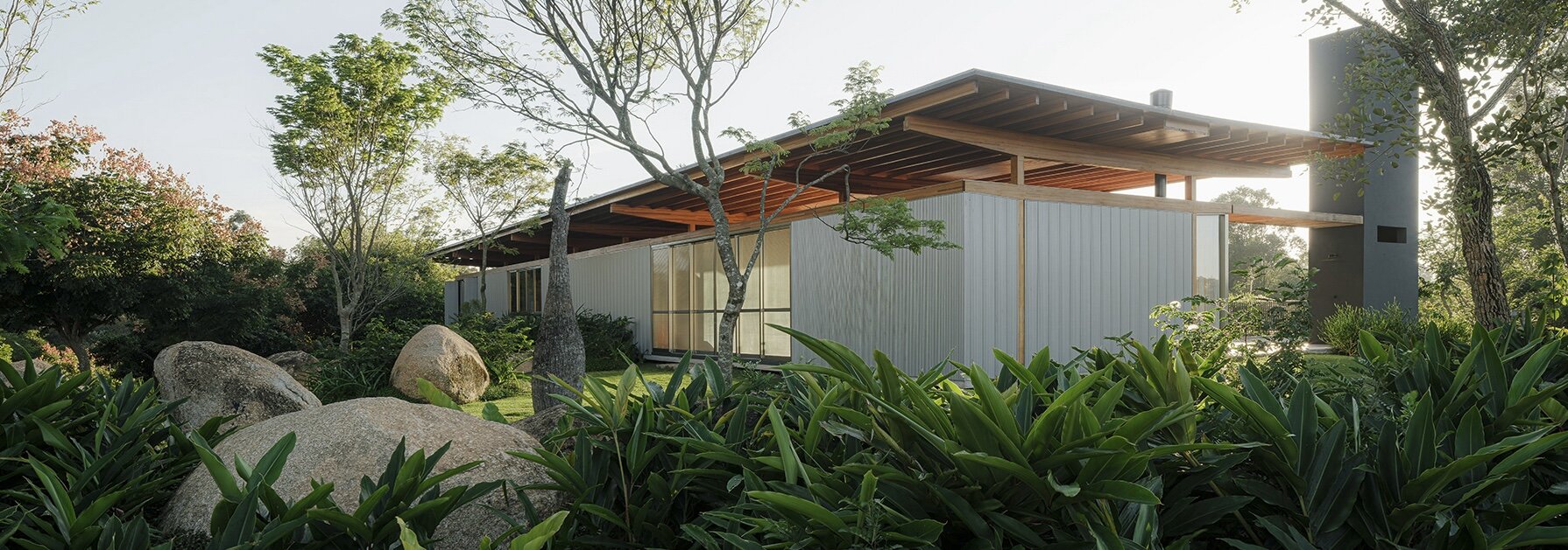 boulders and native trees size footprint of brazil timber home