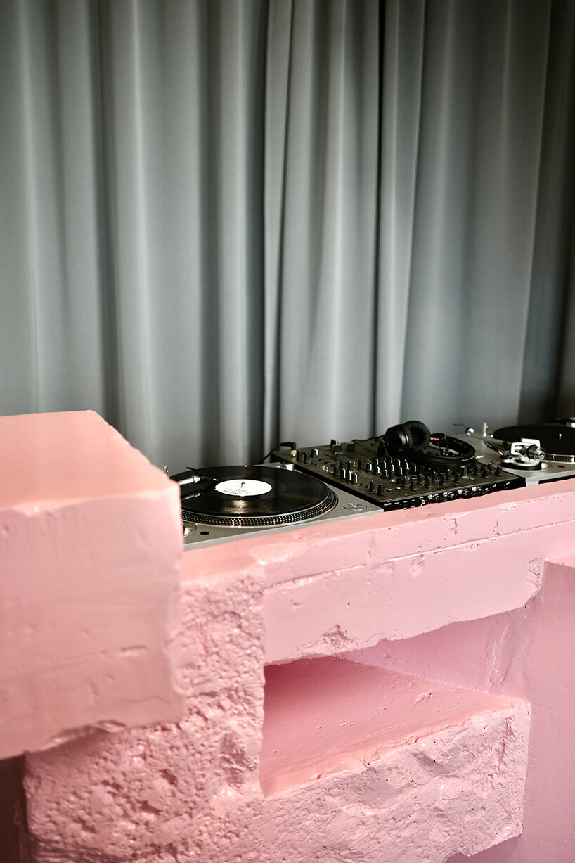 pink sculptural DJ booth by YONT studio sits inside hybrid record store in berlin - 8