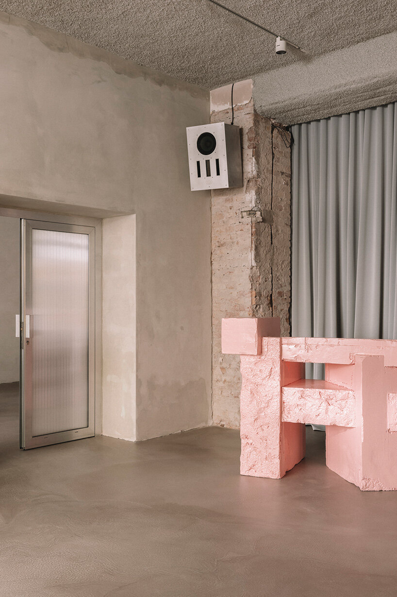 pink sculptural DJ booth by YONT studio sits inside hybrid record store in berlin - 4